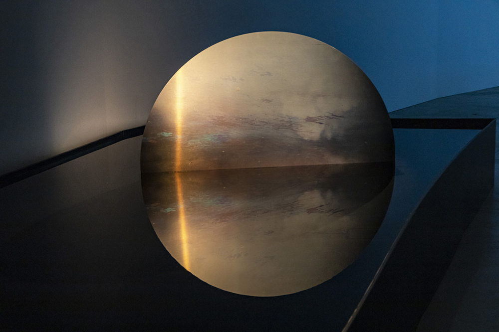 One semisphere in water, the reflection gives the illusion that it's a full circle.